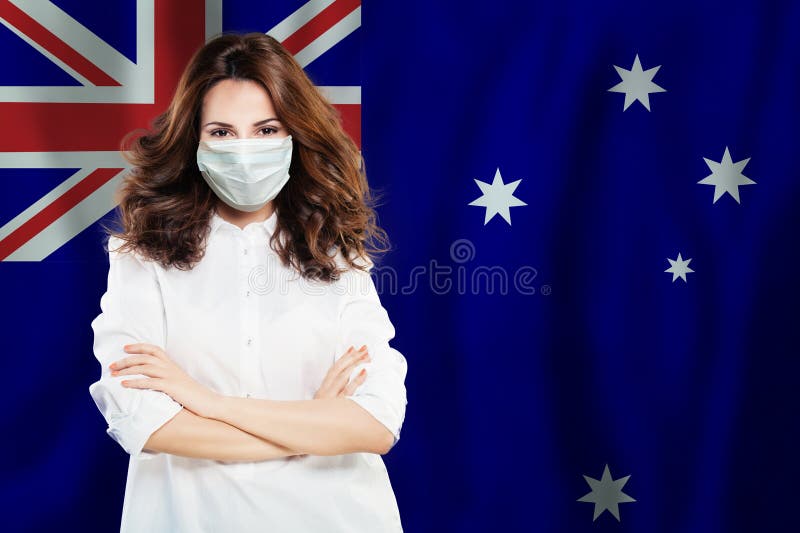 Happy scientist, nurse or doctor in medical face mask on Australian flag background. Flu epidemic and virus stock photography Happy scientist, nurse or doctor in medical face mask on Australian flag background. Flu epidemic and virus stock photography