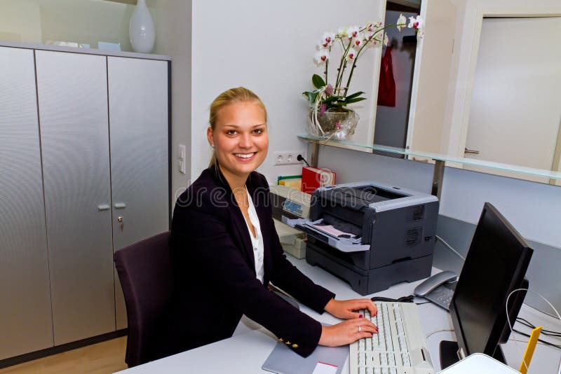 Happy secretary in a office