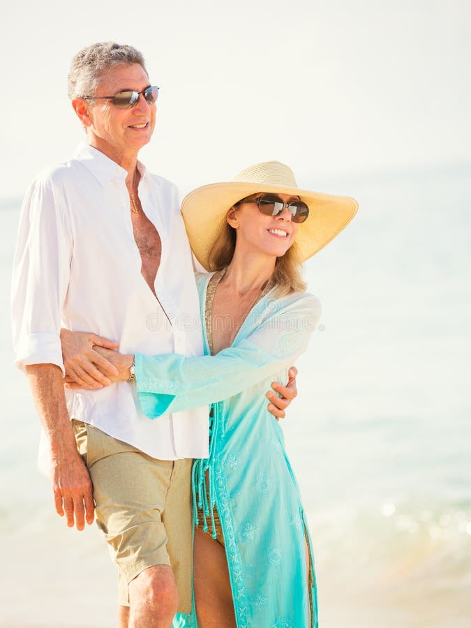 Happy Senior Couple On The Beach Retirement Luxury Tropical Res Stock