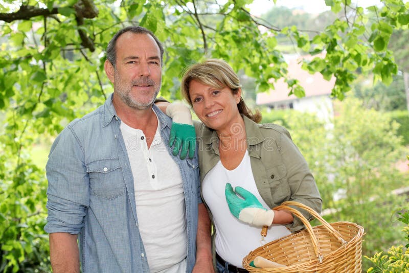 Happy senior couple gardening royalty free stock image Happy senior couple gardening royalty free stock image