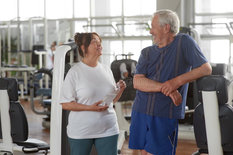 Happy Senior Couple At Gym Stock Photo Image Of Joyful Center