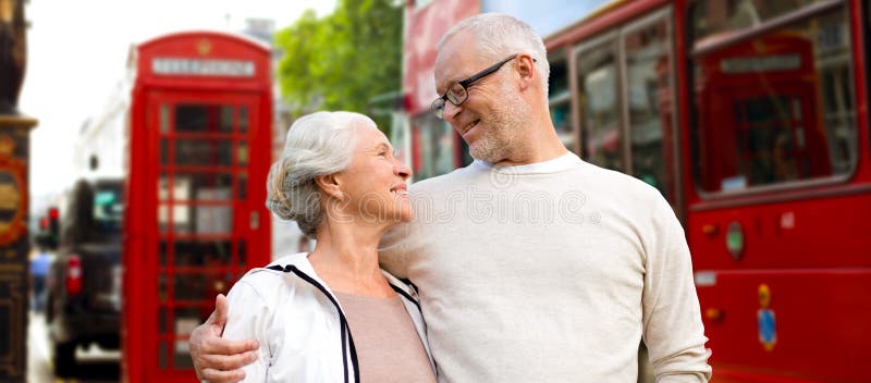 Happy senior couple on london street in england