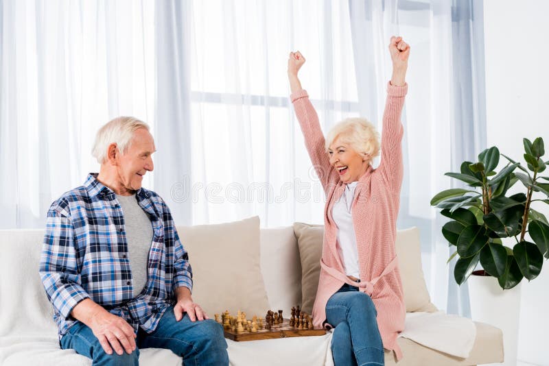 happy senior couple playing chess at home royalty free stock photography happy senior couple playing chess at home royalty free stock photography