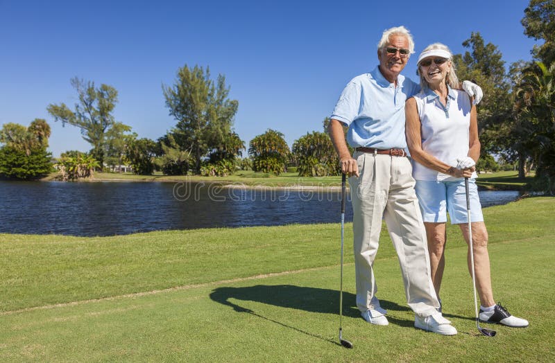 Happy Senior Couple Playing Golf