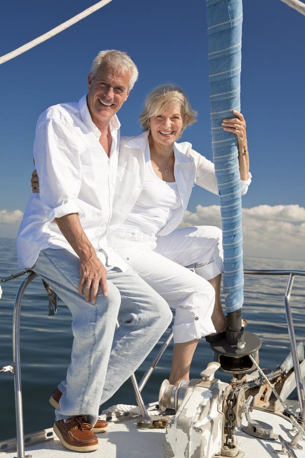 Happy Senior Couple on a Sail Boat