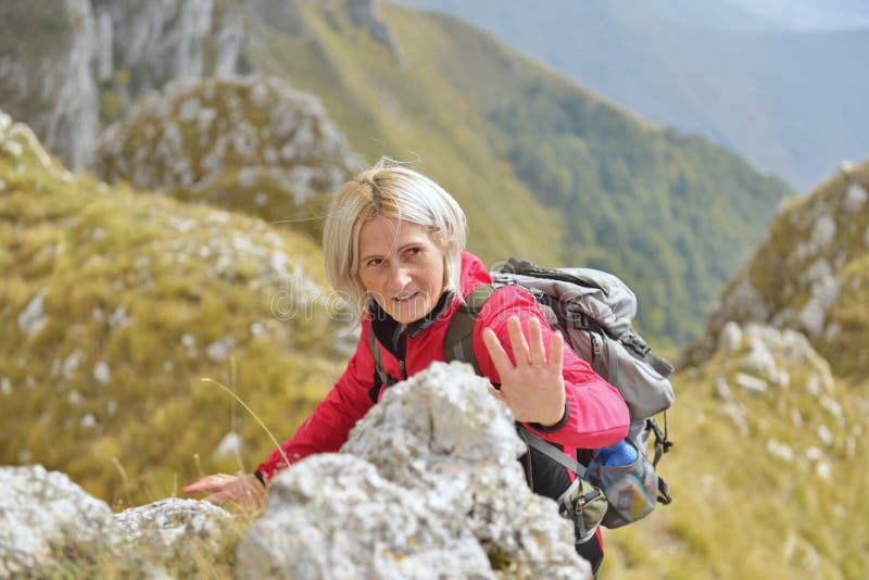 Happy senior female hiker enjoying outdoor activity royalty free stock image Happy senior female hiker enjoying outdoor activity royalty free stock image