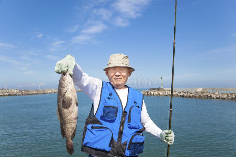 1,290 Fisherman Showing Stock Photos - Free & Royalty-Free Stock Photos  from Dreamstime