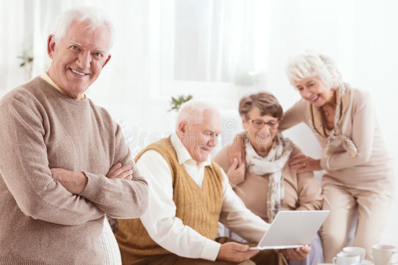 Happy Senior Man with Friends Stock Image - Image of room, mature: 82346301
