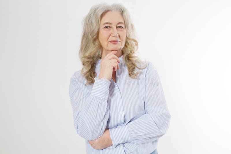 Happy senior woman with crossed arms isolated on white background. Positive elderly seniors life living and european old beauty royalty free stock photo Happy senior woman with crossed arms isolated on white background. Positive elderly seniors life living and european old beauty royalty free stock photo