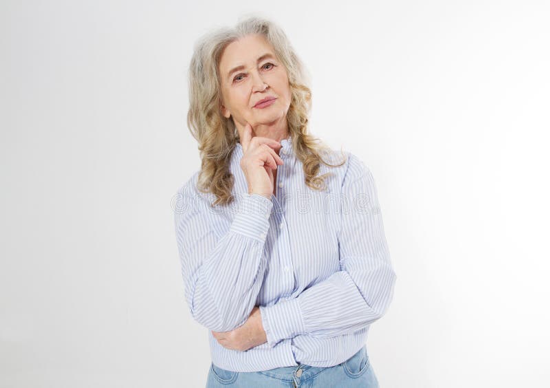 Happy senior woman with crossed arms isolated on white background. Positive elderly seniors life living and european old beauty royalty free stock images Happy senior woman with crossed arms isolated on white background. Positive elderly seniors life living and european old beauty royalty free stock images