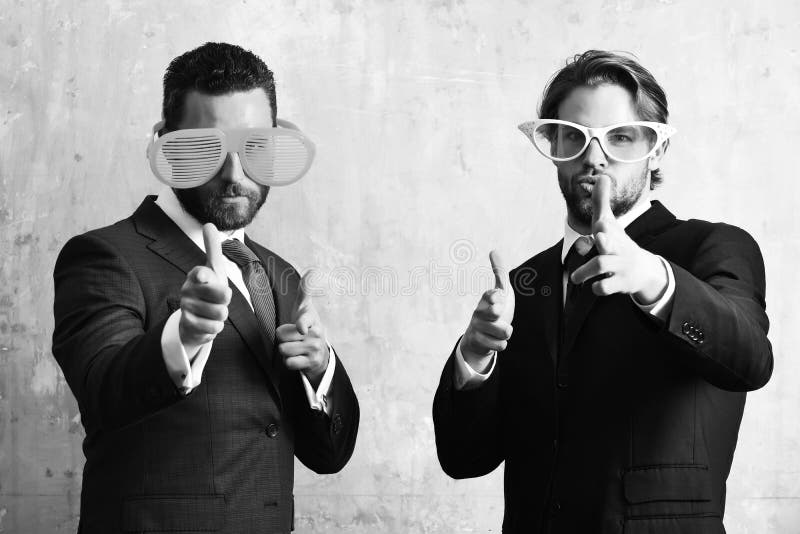 Happy and serious bearded men with funny summer eyeglasses royalty free stock photos Happy and serious bearded men with funny summer eyeglasses royalty free stock photos