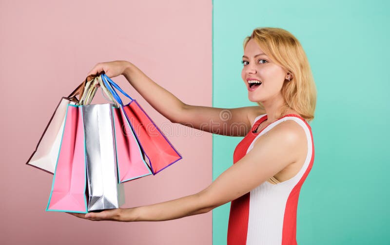 Happy shopping day. Easy way of shopping. Girl with paper bags. Black friday. Retail and consumerism. In love with her stock image Happy shopping day. Easy way of shopping. Girl with paper bags. Black friday. Retail and consumerism. In love with her stock image