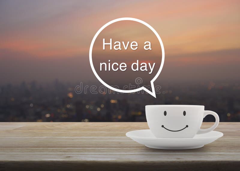 Happy smile white coffee cup on wooden table over blur cityscape on warm light sunshine, Have a nice day massage concept stock photos Happy smile white coffee cup on wooden table over blur cityscape on warm light sunshine, Have a nice day massage concept stock photos