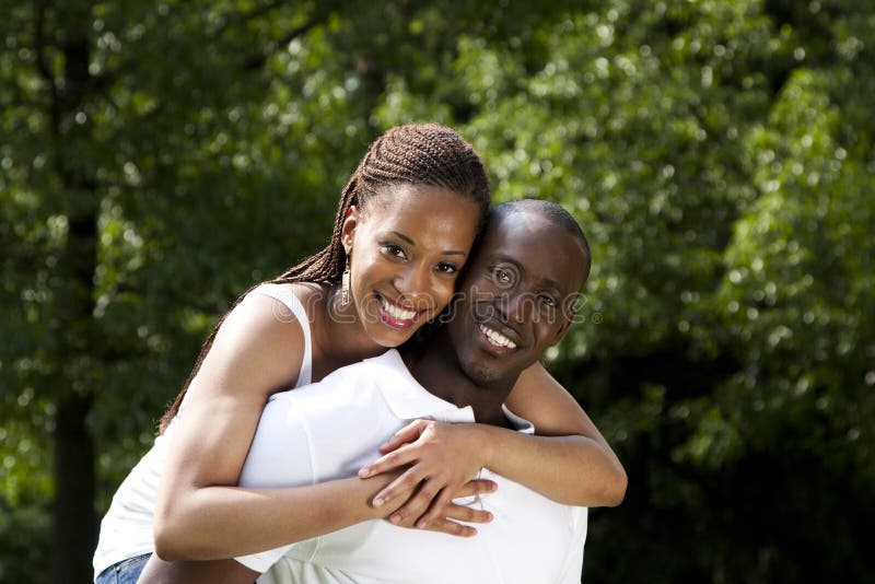 Happy smiling African couple royalty free stock images
