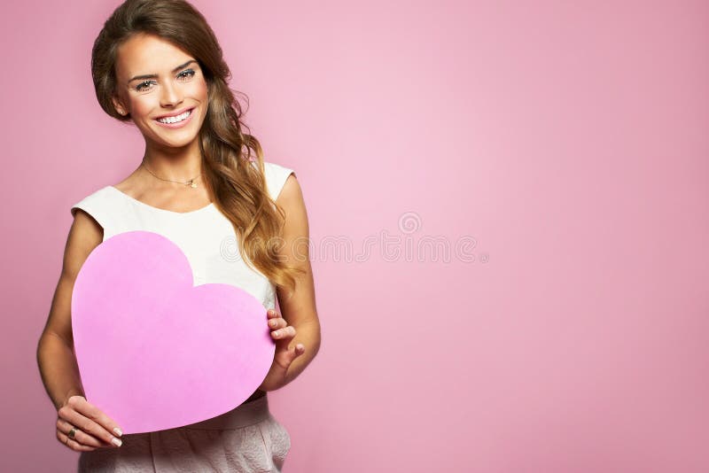 Pink background model and heart. Pink background model and heart