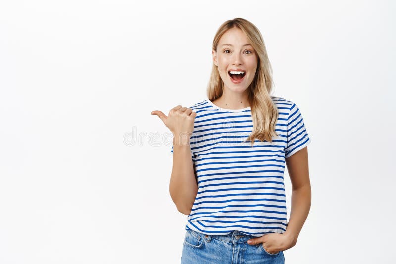 Happy Smiling Blond Woman Pointing Finger Left, Showing Announcement or ...
