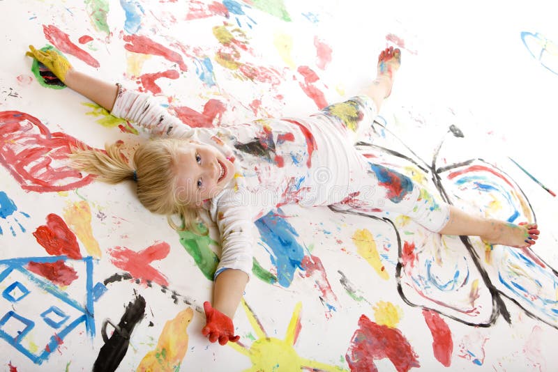 Happy smiling child full with color (paint)