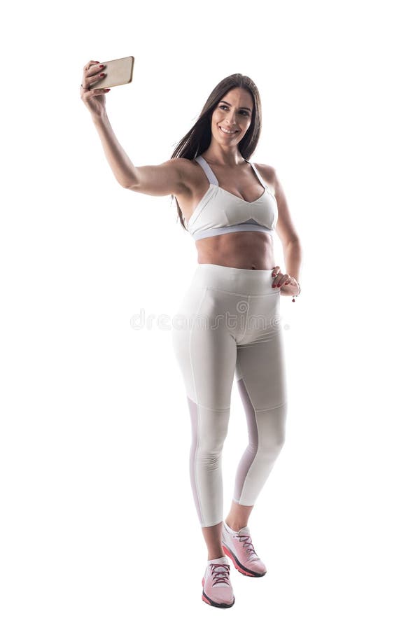 Happy smiling confident fitness woman taking selfie after gym exercises royalty free stock photo Happy smiling confident fitness woman taking selfie after gym exercises royalty free stock photo