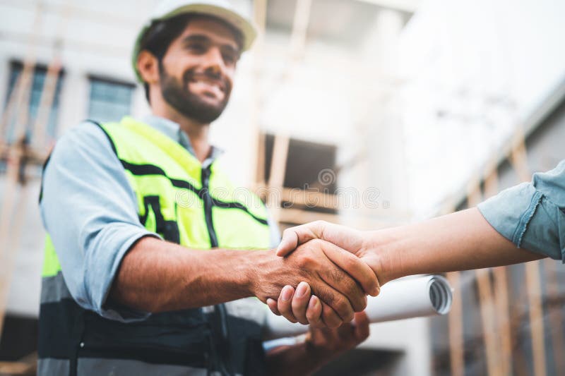 Construction Workers Shaking Hands Stock Image Image of project
