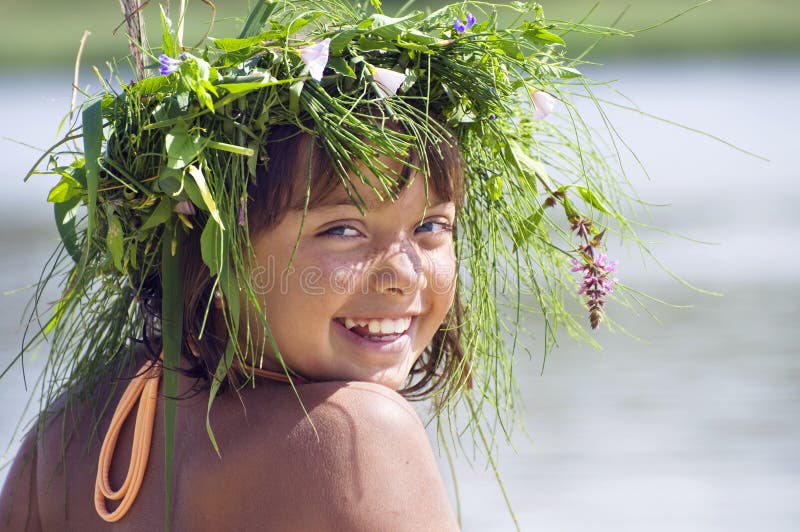 Happy smiling girl with wreath