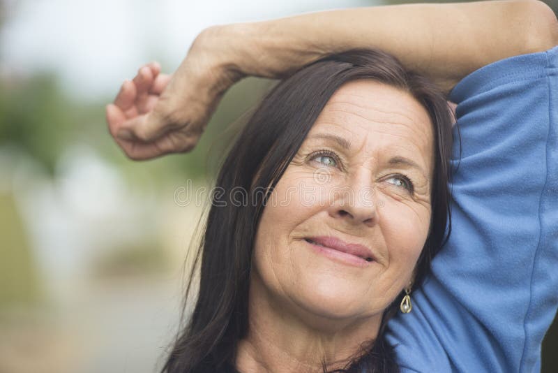 Happy smiling relaxed mature woman