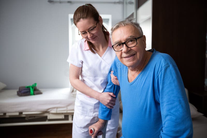 Happy smiling satisfied senior man at nursing home stock photo Happy smiling satisfied senior man at nursing home stock photo