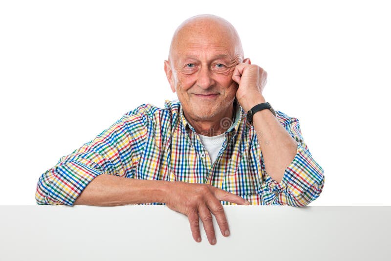 Happy smiling senior man holds a blank board royalty free stock photography
