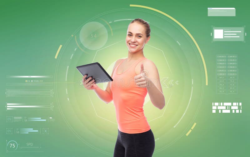 Happy smiling sportive young woman with tablet pc