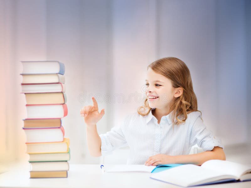 Happy smiling student girl counting books.