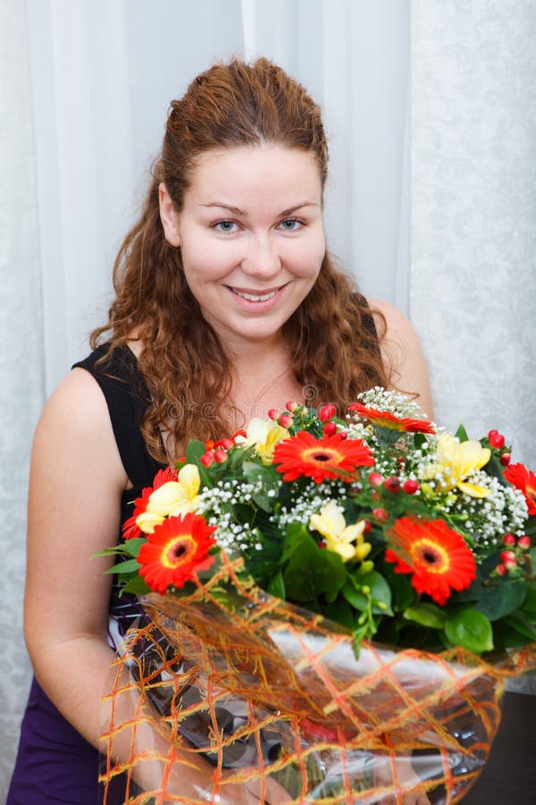 Happy Smiling Young Woman Sitting with Flowers Stock Photo - Image of ...