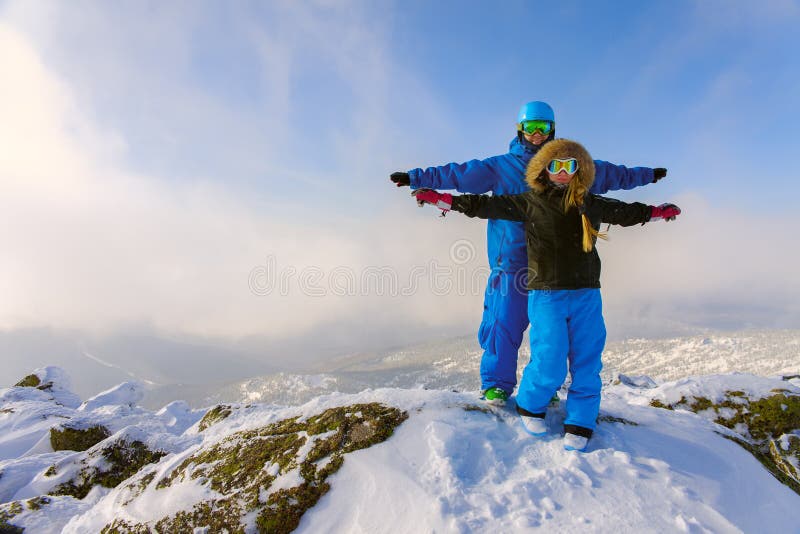 Happy snowboarding couple royalty free stock photo