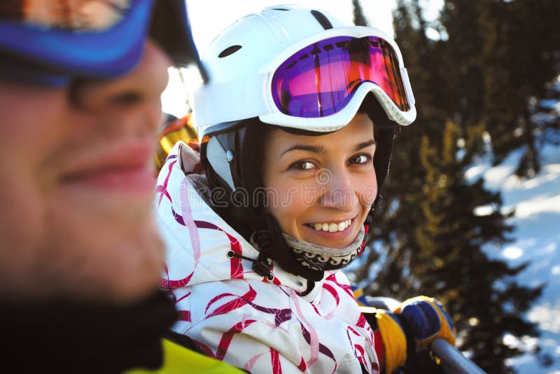 Happy snowboarding girls stock photos