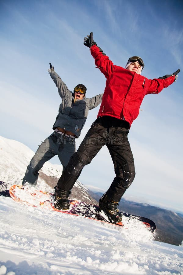 Happy snowboarding team