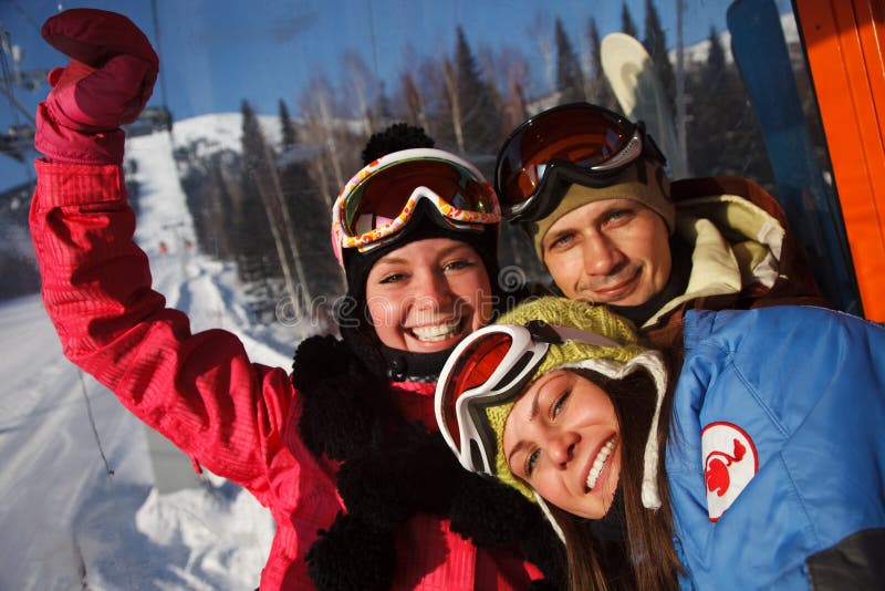 Happy snowboarding team