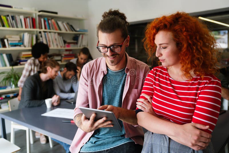 Happy software developers working on meeting, Programming advanced code artificial intelligence. royalty free stock photo