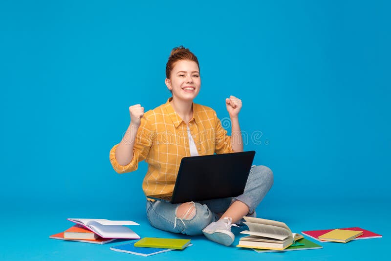 Happy student girl with laptop celebrating success stock photos Happy student girl with laptop celebrating success stock photos
