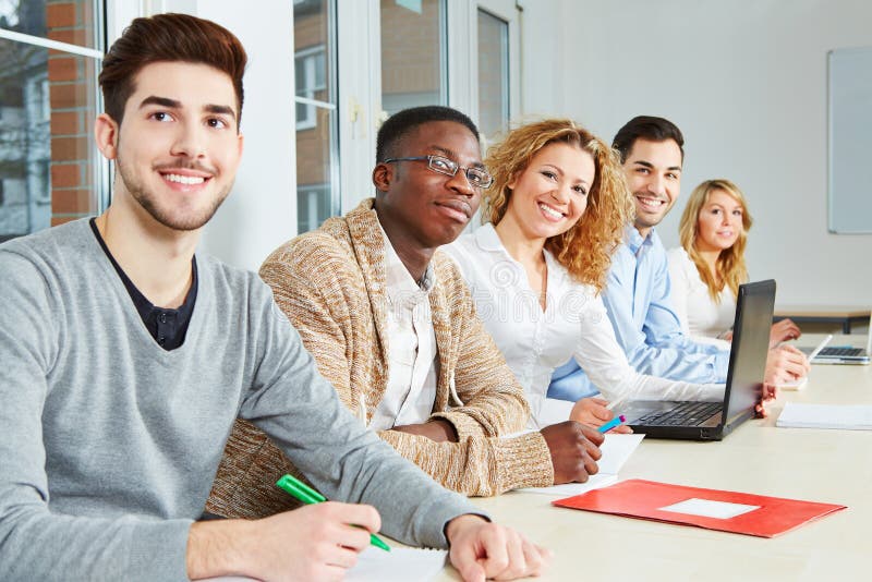 Happy students in class stock image