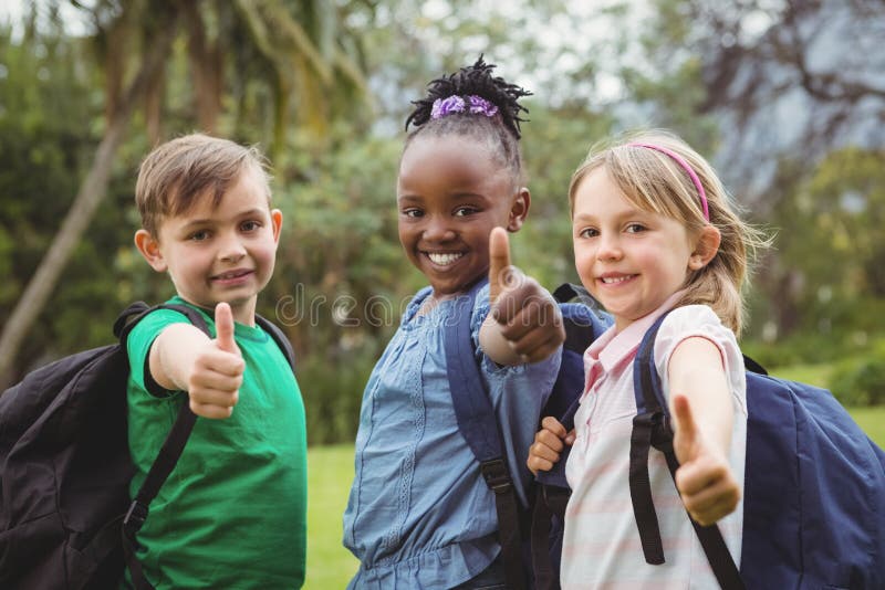Happy Students Wearing School Bags Stock Photos Free & RoyaltyFree
