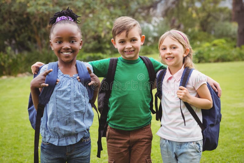 Happy Students Wearing School Bags Stock Photos Free & RoyaltyFree