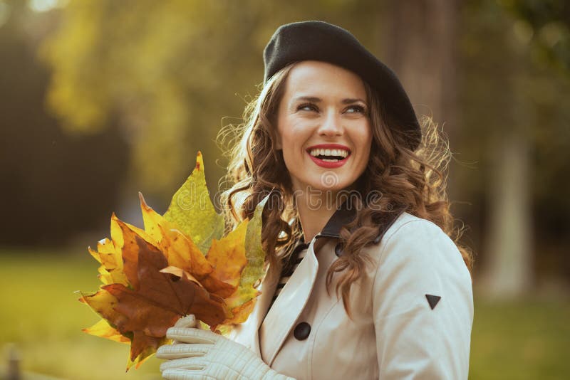 Happy Stylish Woman in Beige Trench Coat and Black Beret Stock Image ...