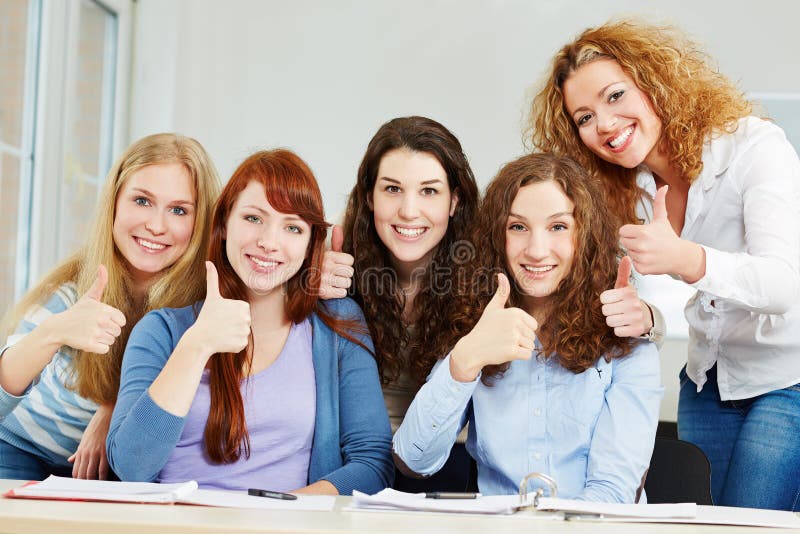 Happy successful women holding stock image