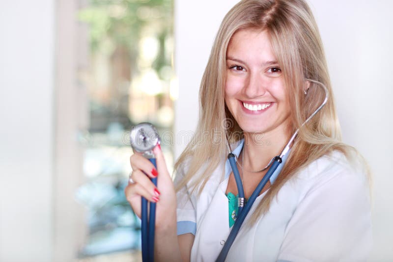 Happy successful young female doctor stock photos Happy successful young female doctor stock photos