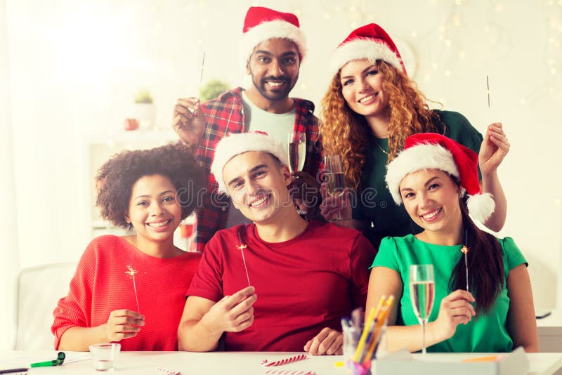 Happy team celebrating christmas at office party royalty free stock image Happy team celebrating christmas at office party royalty free stock image