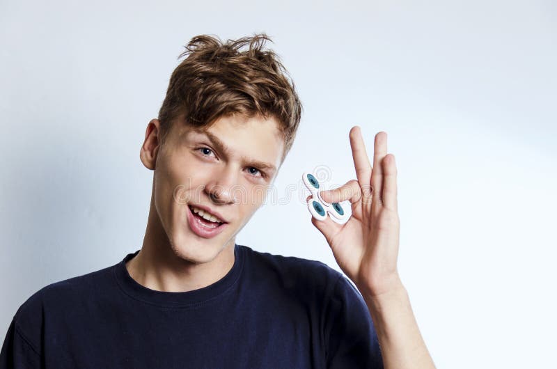 Happy Teen With Fidget Spinner Stock Photo - Image of shot, object: 103103980