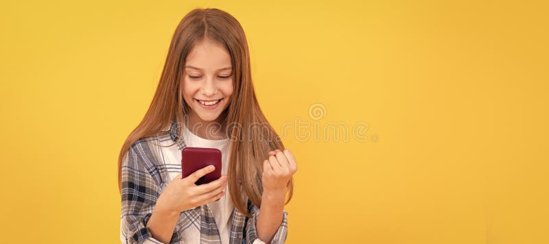 happy teen girl chat online. school blogging. modern communication technology. Child portrait with phone, horizontal