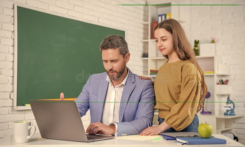 Happy teen kid with man teacher in classroom. education stock photos