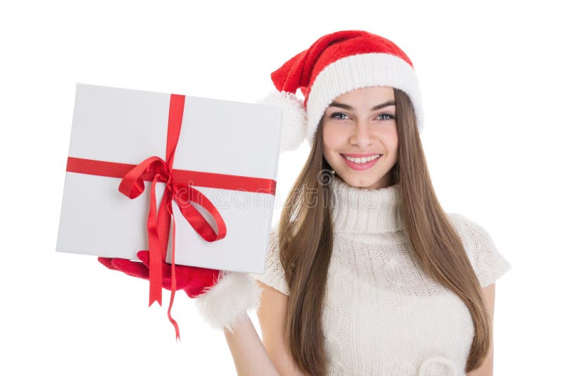 Happy teenage girl with Santa hat and big gift box