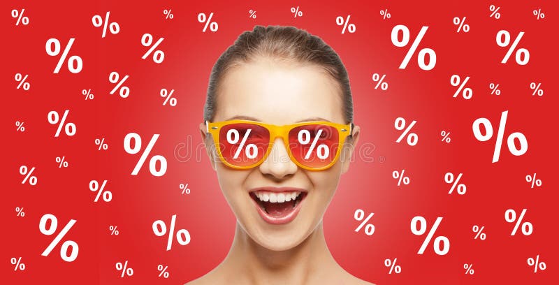 Happy teenage girl in shades with percentage signs royalty free stock photos Happy teenage girl in shades with percentage signs royalty free stock photos