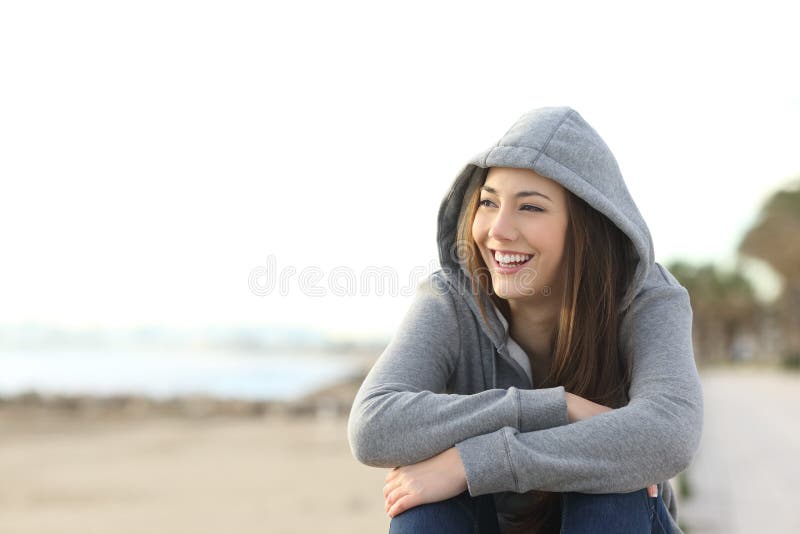 Happy teenager girl looking at side outdoors royalty free stock photo Happy teenager girl looking at side outdoors royalty free stock photo