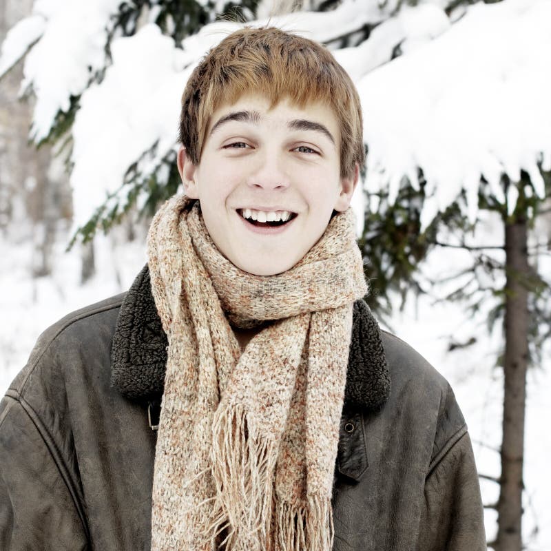 Happy Teenager in Winter Forest